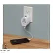 Travel Adapter PRO World & USB connected to a wall